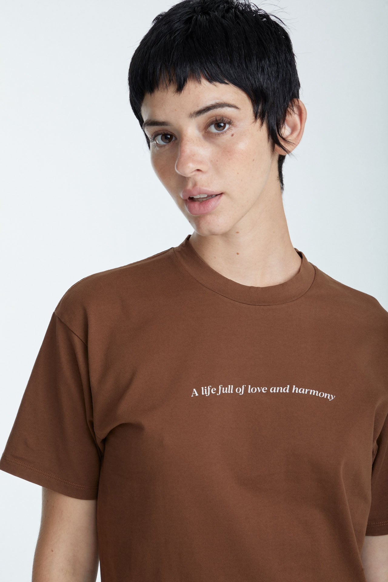 Unisex "Love and Harmony" Graphic Tee Brown